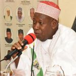 Ganduje Denies Stepping On Kwankwaso's Poster Intentionally