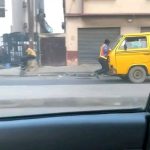 Policeman Clings To The Bonnet Of A Moving Danfo Bus, In Lagos (Video)