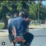 Viral Video Of Lovers Kissing Passionately On A Moving Bike