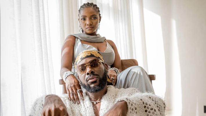 Adekunle Gold and Simi celebrating as they welcome twins