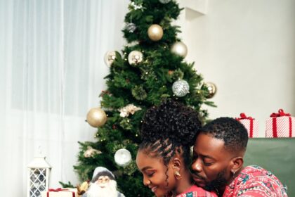 Adekunle Gold and Simi celebrating as they welcome twins