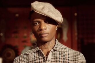 Wizkid marking his 10 billion Spotify streams achievement as a global music icon.