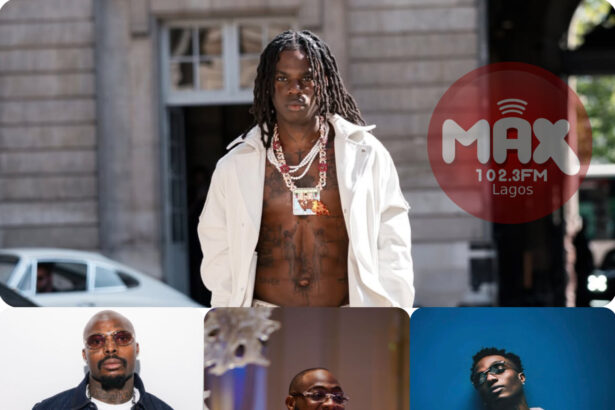 Rema celebrates his triple win at the 9th AFRIMA Awards in Lagos, Nigeria.