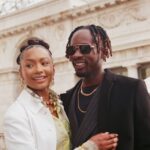 Mr Eazi and Temi Otedola smiling together, showcasing their stylish and playful celebrity marriage