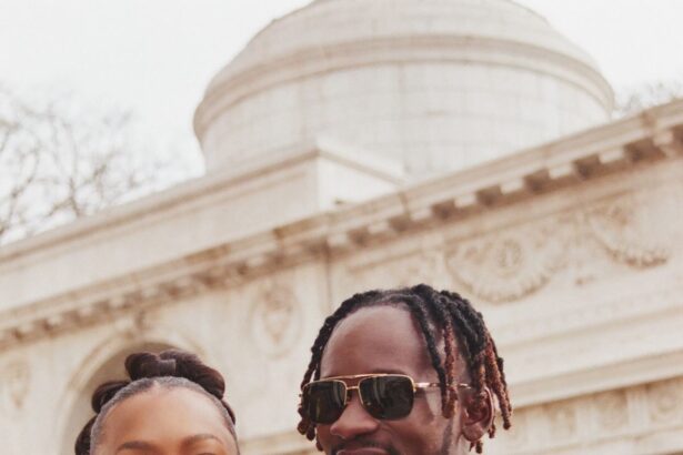 Mr Eazi and Temi Otedola smiling together, showcasing their stylish and playful celebrity marriage